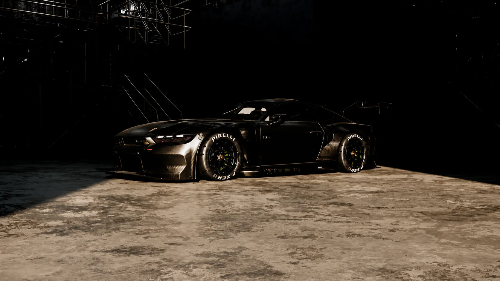 Black race car in a dark industrial workshop